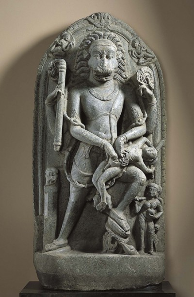A chlorite sculpture of Narasimha, a part-man, part-lion avatar of Vishnu, shown disemboweling his enemy over his lap.