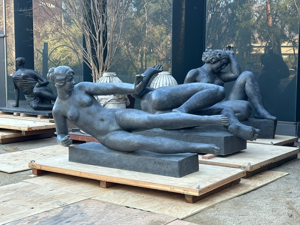 Aristide Maillol's three monumental figures grouped together in storage for cleaning and refurbishment of their protective wax coating