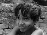 Image of a young boy from Sajit Ray's Pather Panchal film